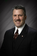 Augustine, Eric R.